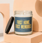 Glass candle with gold text reading "First Home, First Memories", "The Boxes Can Wait", and "Vowed".