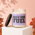 Candle with label "Smells Like Maid of Honor Fuel. Apply Liberally. Vowed."