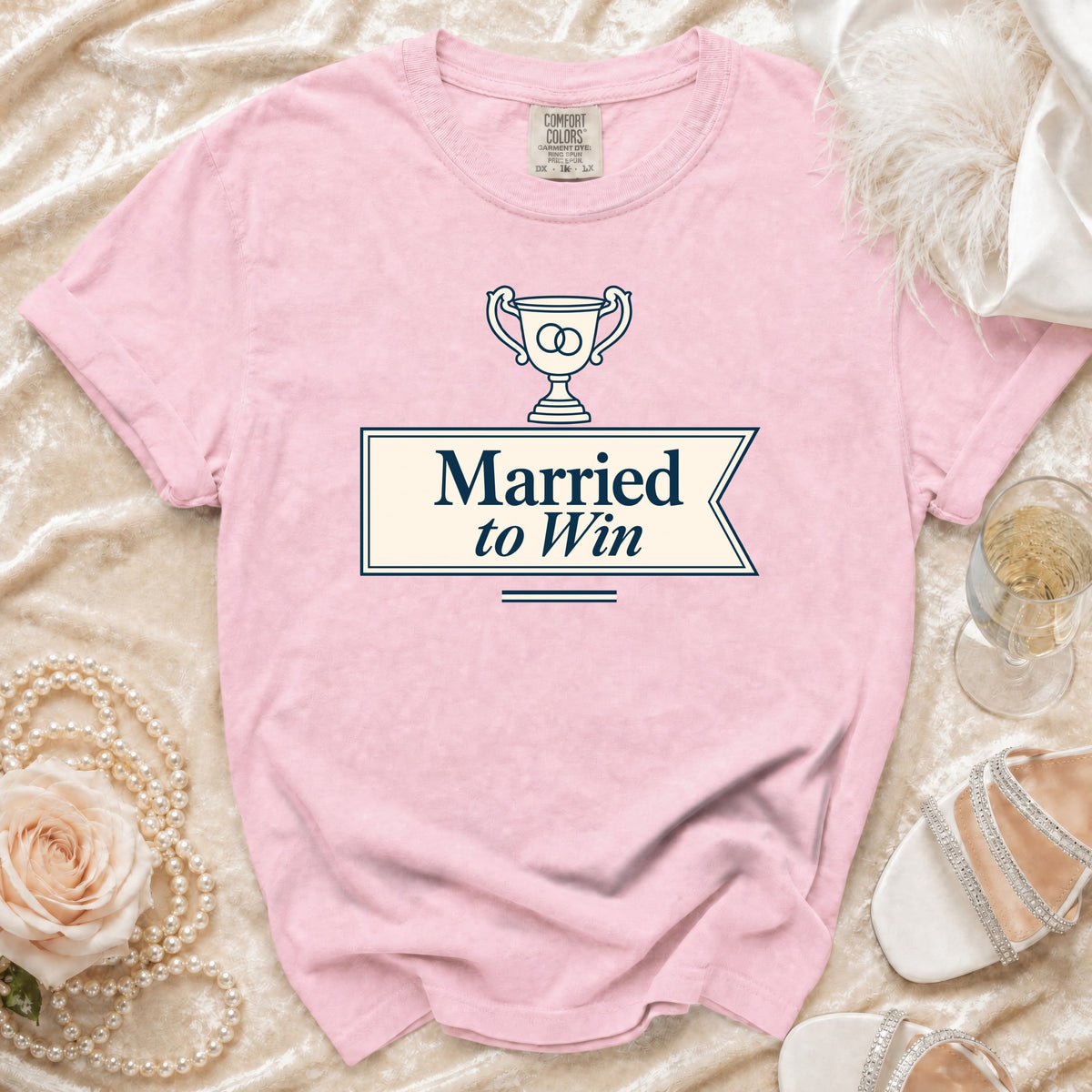 Pink t-shirt with "Married to Win" graphic and wedding trophy emblem.