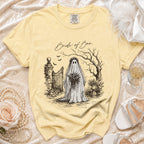 Light yellow t-shirt with "Bride of Boo" graphic of a ghost bride and gothic gate.