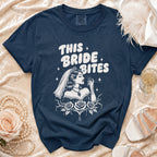 Navy t-shirt with "THIS BRIDE BITES" text and gothic bride illustration.