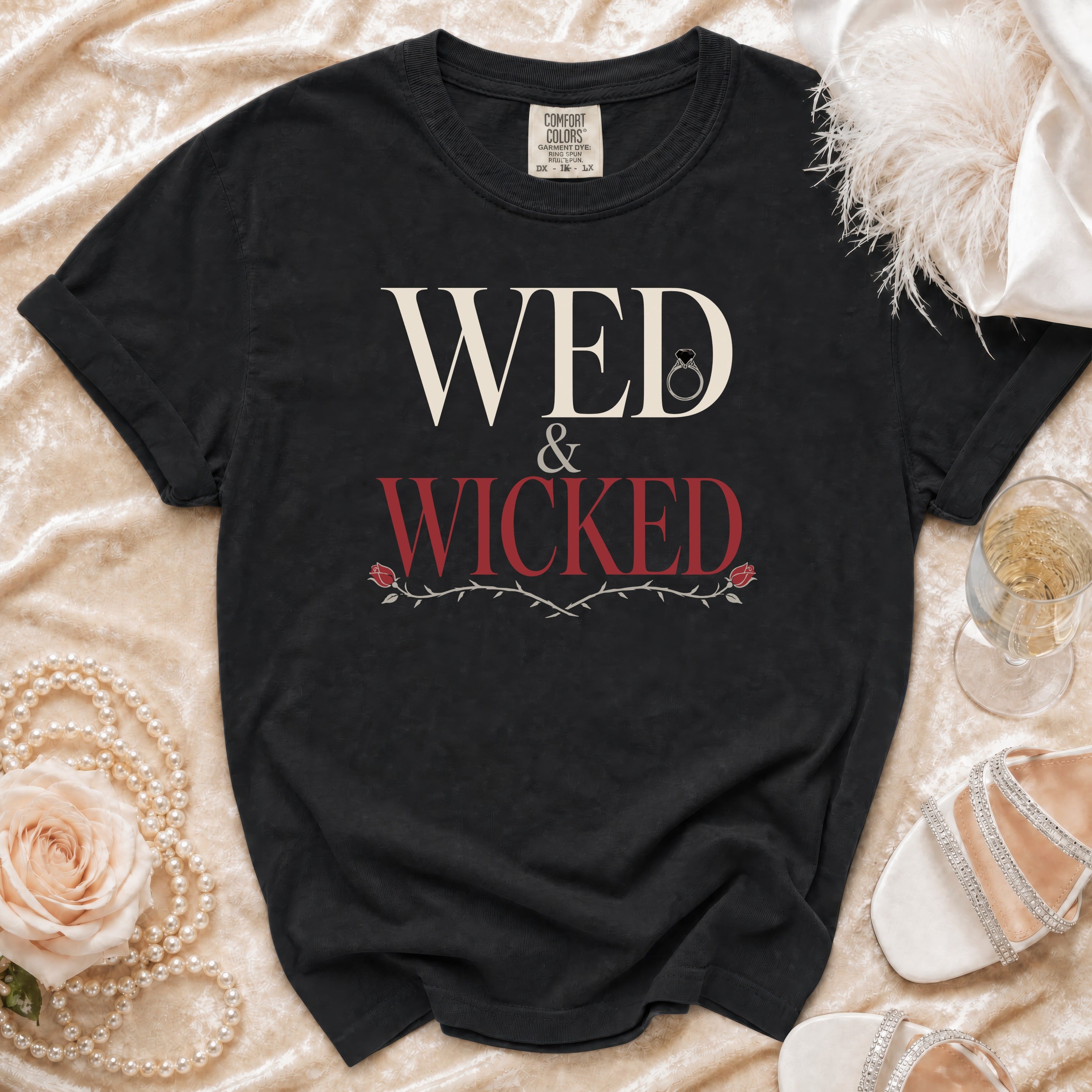 Black t-shirt with "WED & WICKED" text, wedding ring, and rose vine graphic.