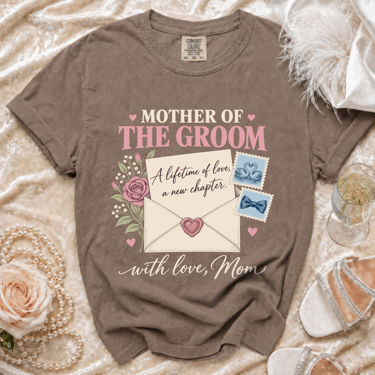 Brown t-shirt with "Mother of the Groom" graphic and handwritten text.