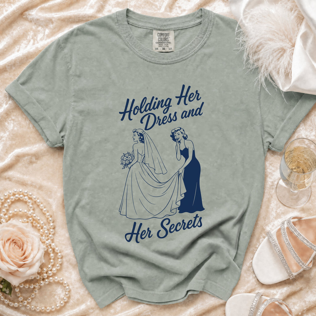 T-shirt with "Holding Her Dress and Her Secrets" design of two women.