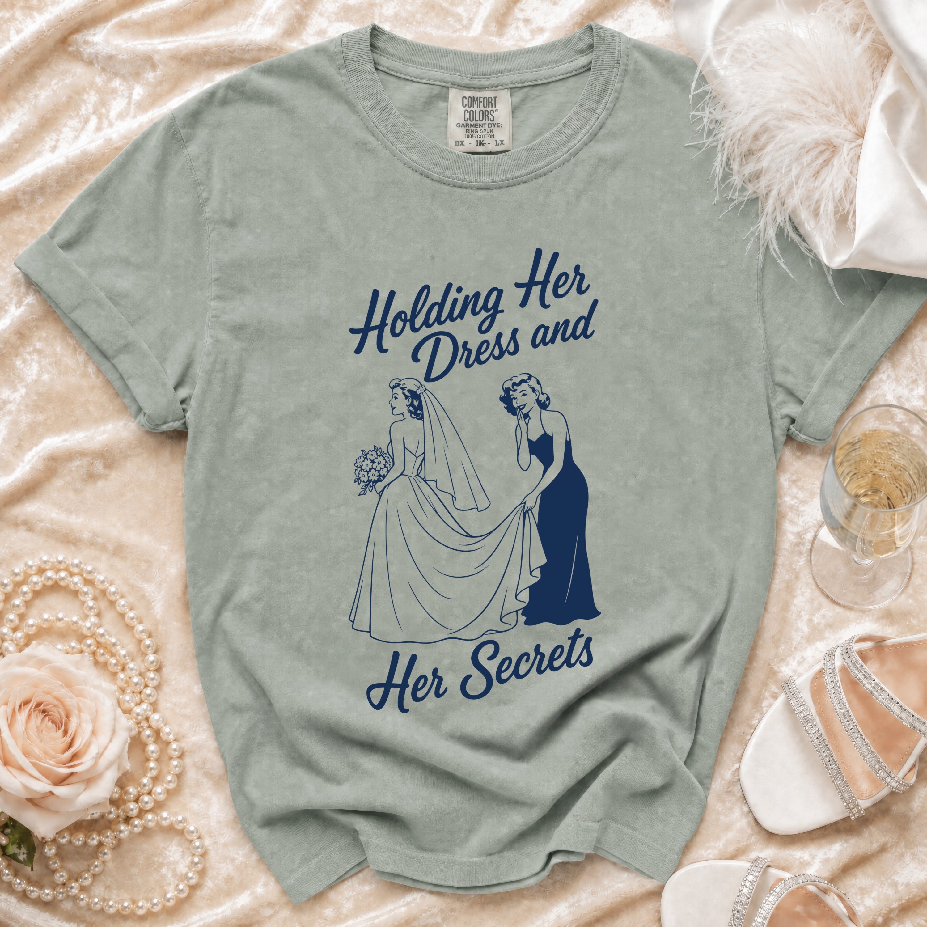 T-shirt with "Holding Her Dress and Her Secrets" design of two women.