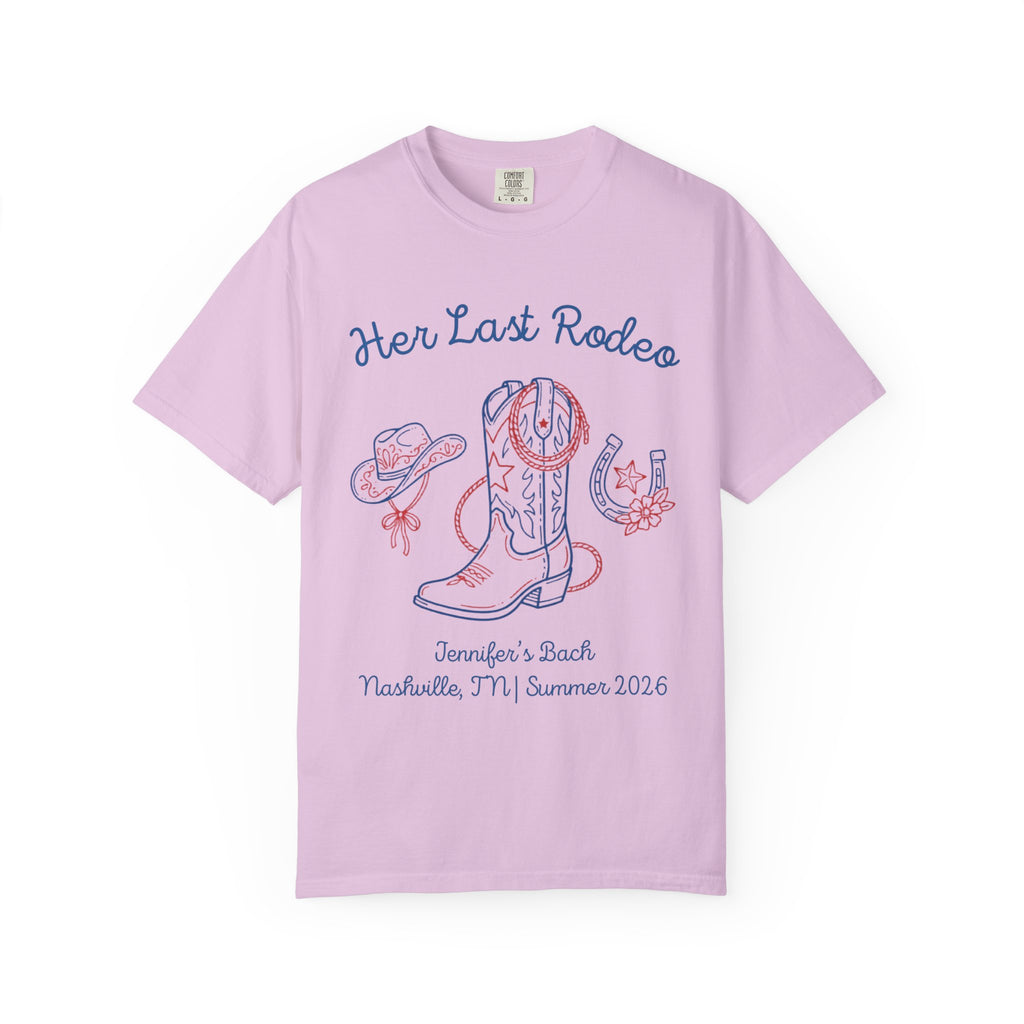 Pink t-shirt with "Her Last Rodeo" text, cowboy boot, and horseshoe.