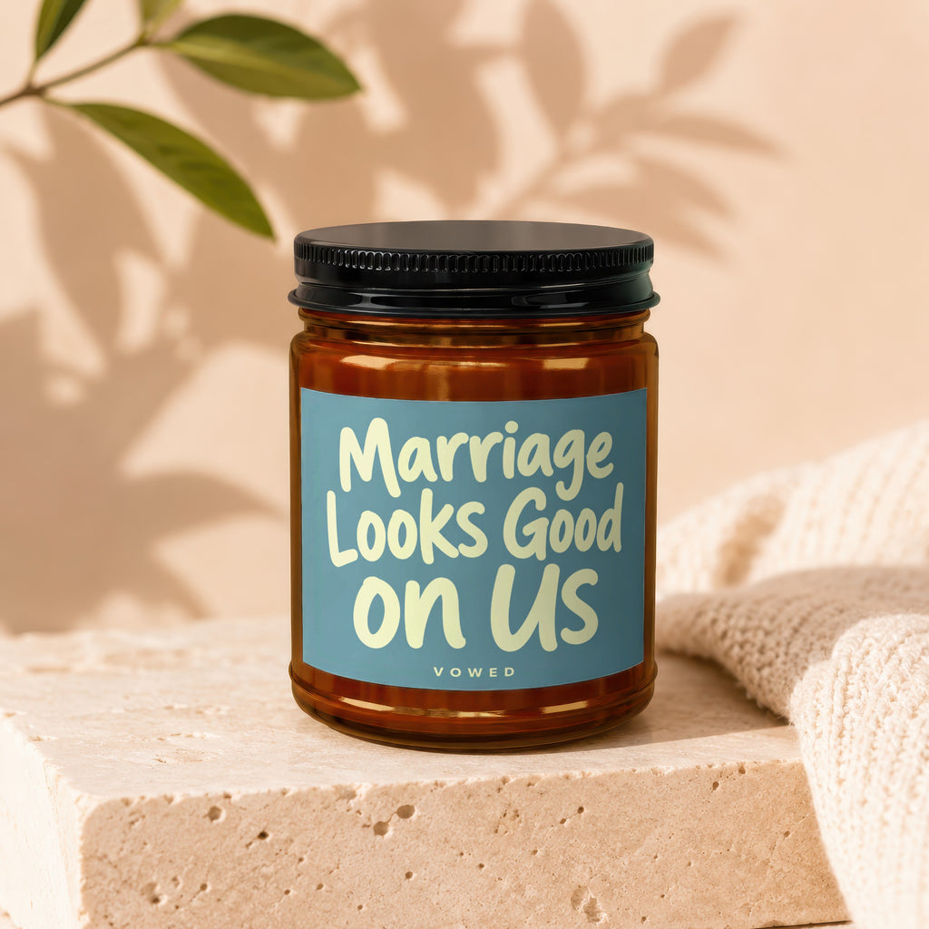Amber jar with black lid labeled "Marriage Looks Good on Us".