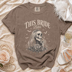 T-shirt with "This Bride Bites" text, skeleton bride, roses, bats, and stars design.