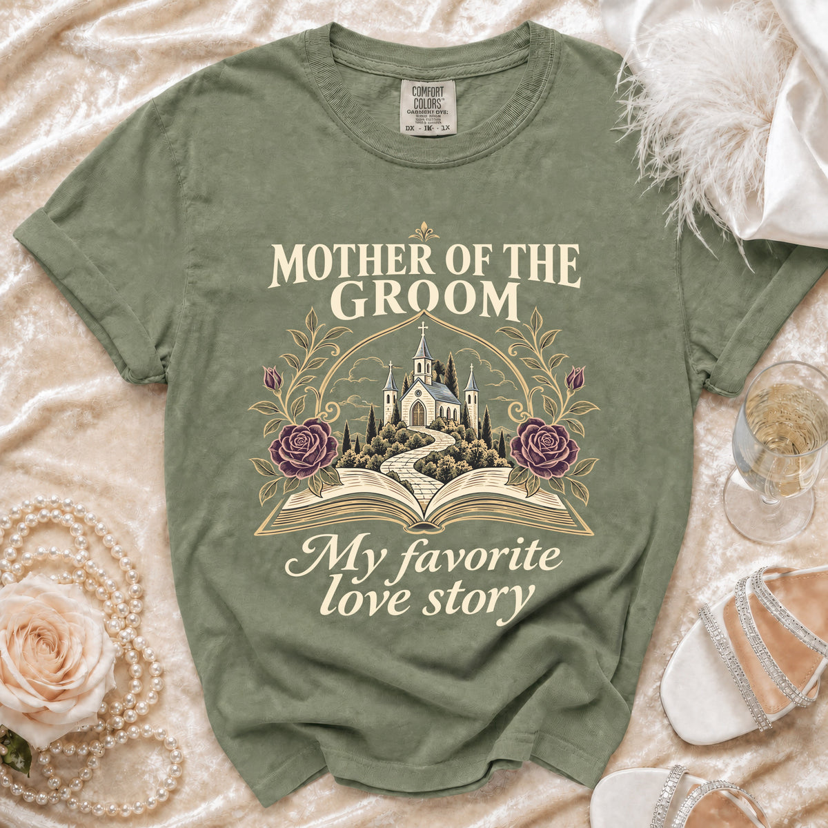 Olive green t-shirt with "Mother of the Groom, My Favorite Love Story" text and floral design.