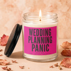 Candle with pink label saying "WEDDING PLANNING PANIC LOADING..."