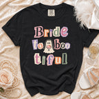 Black t-shirt with "Bride to Boo-tiful" text and ghost graphic.