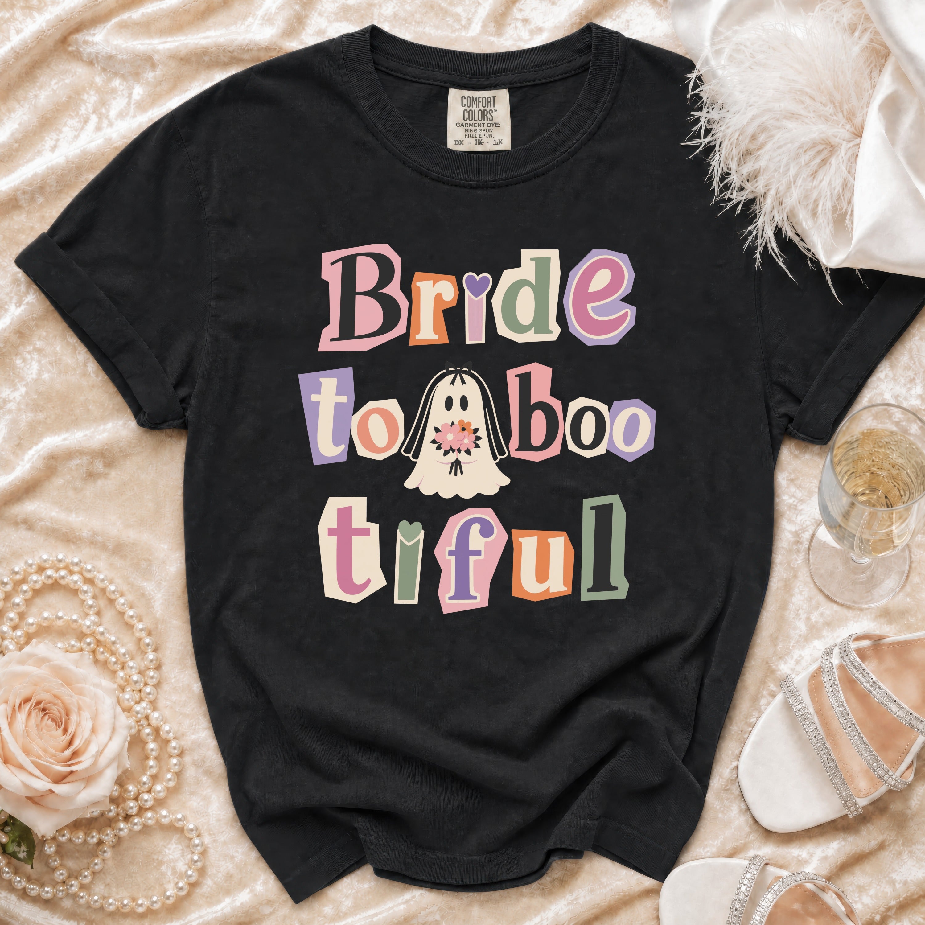 Black t-shirt with "Bride to Boo-tiful" text and ghost graphic.