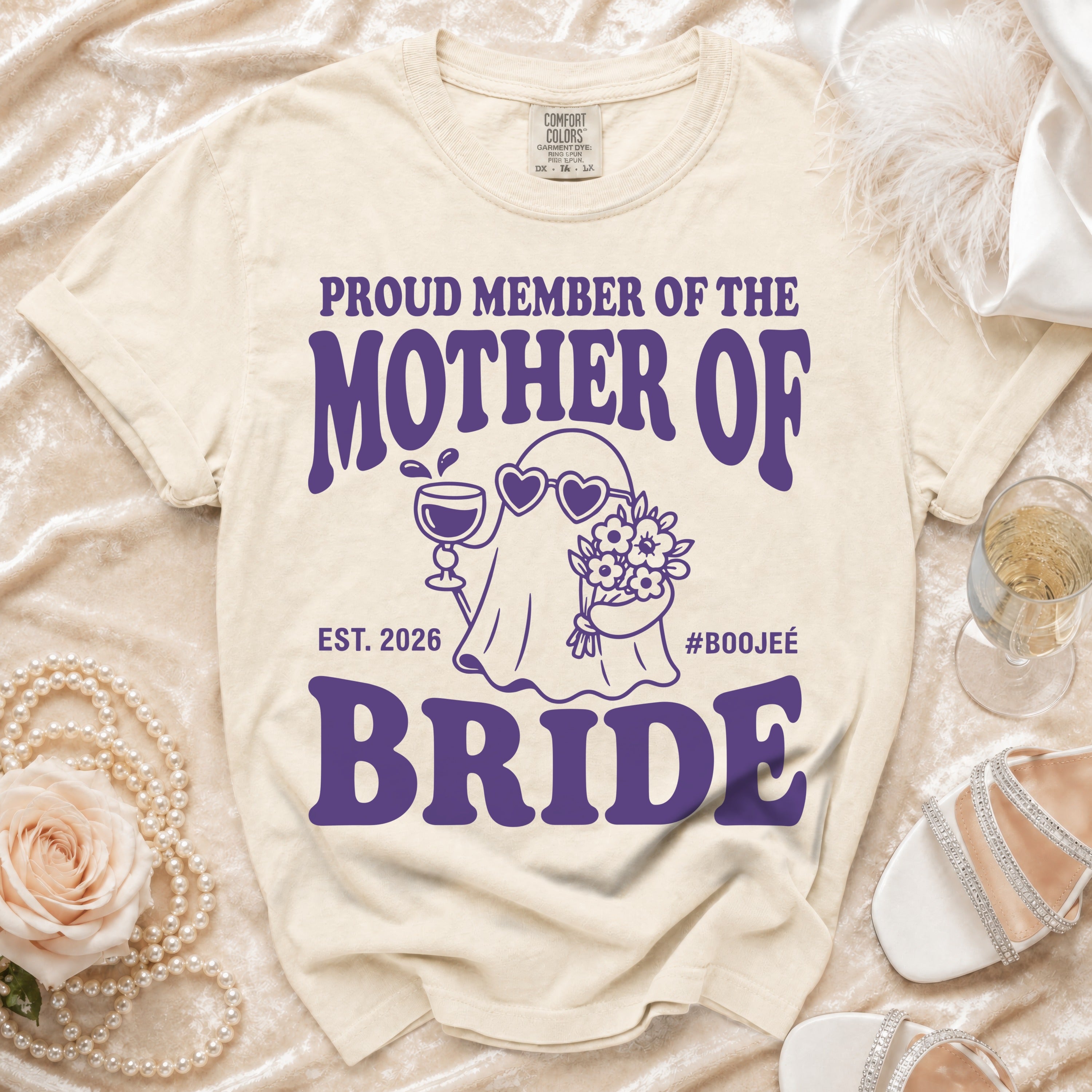 Cream t-shirt with purple text "Proud Member of the Mother of Bride Est. 2026 #Boojee".