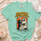 Mint green t-shirt with skeletons cutting cake, "Happily Never After" and "'Til Death Do Us Part".