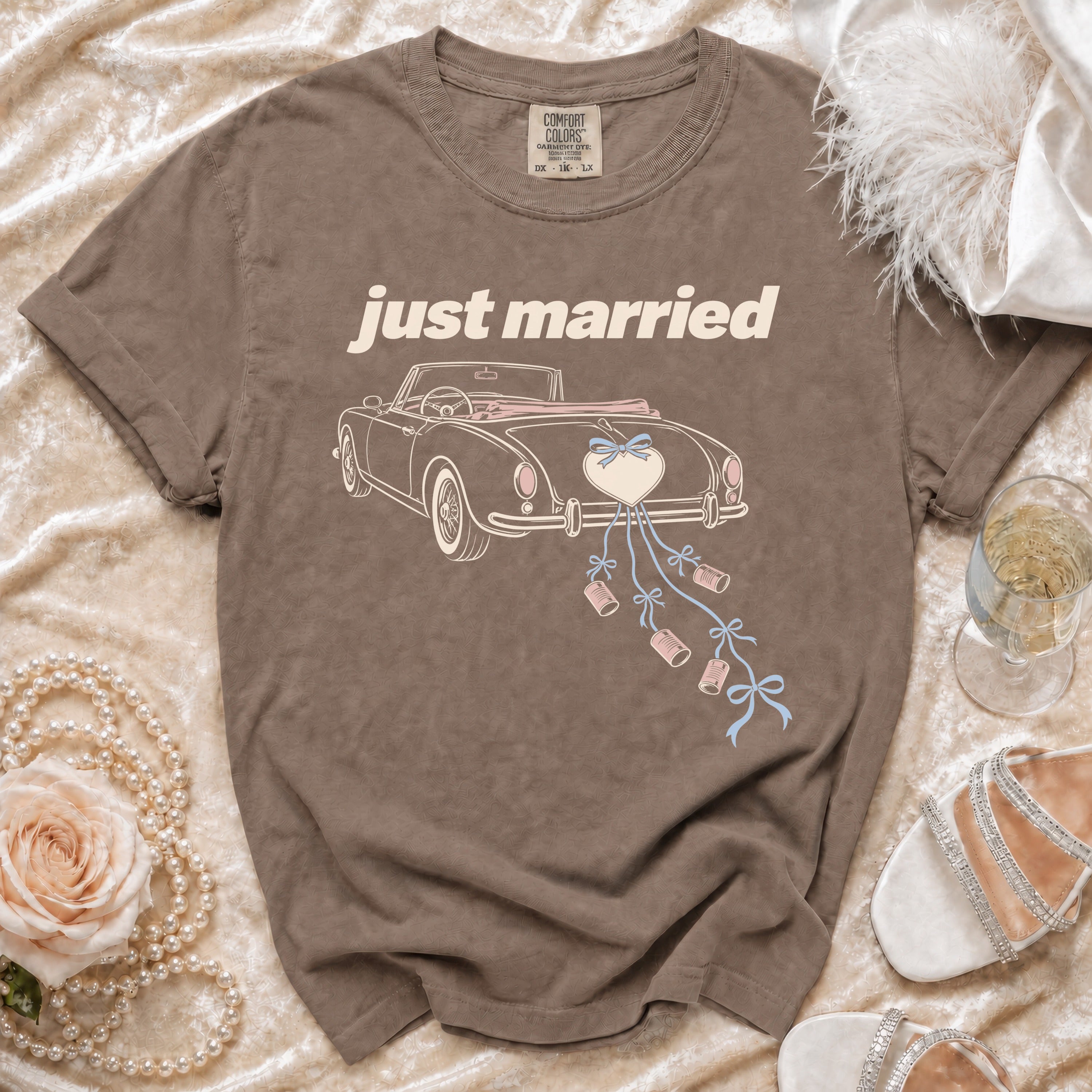 Brown t-shirt with "just married" text and a vintage car illustration.