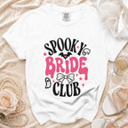 White t-shirt with "Spooky Bride Club" graphic, bat, ghost, and bow.