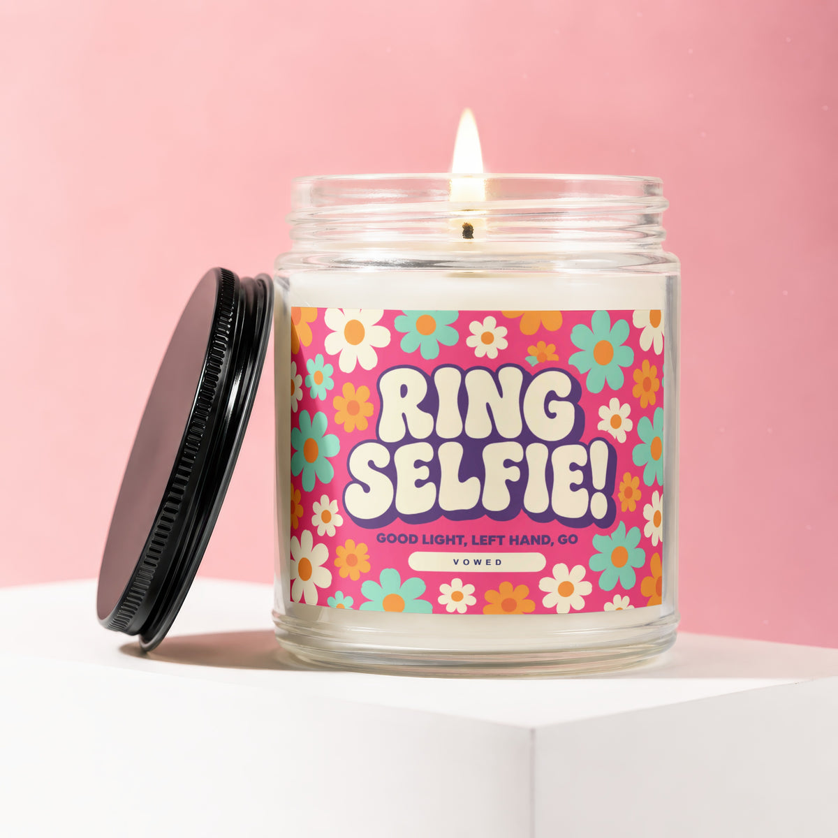 Glass jar candle with "RING SELFIE! GOOD LIGHT, LEFT HAND, GO VOWED" text.