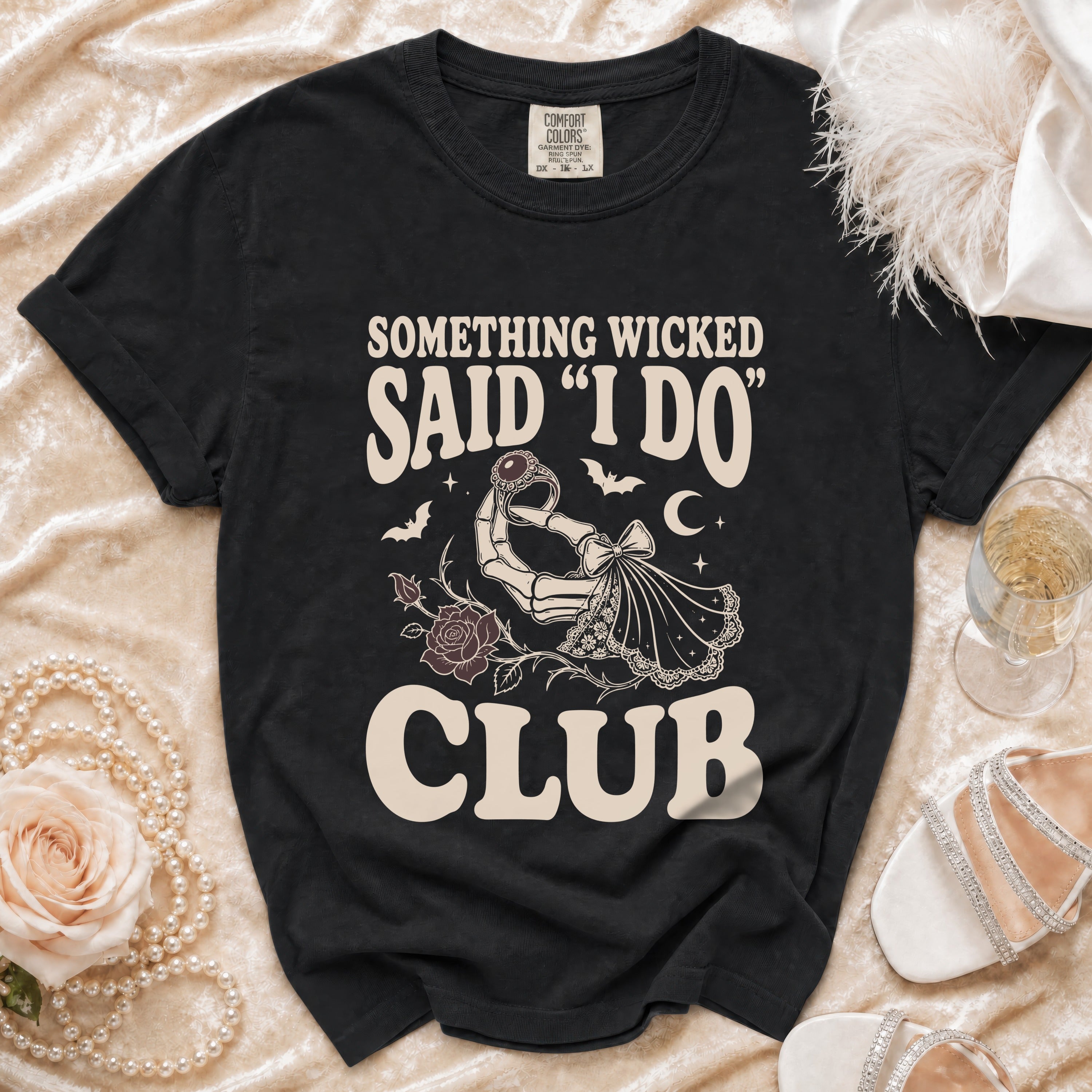 Black t-shirt with "Something Wicked Said 'I Do' Club" text and graphic.