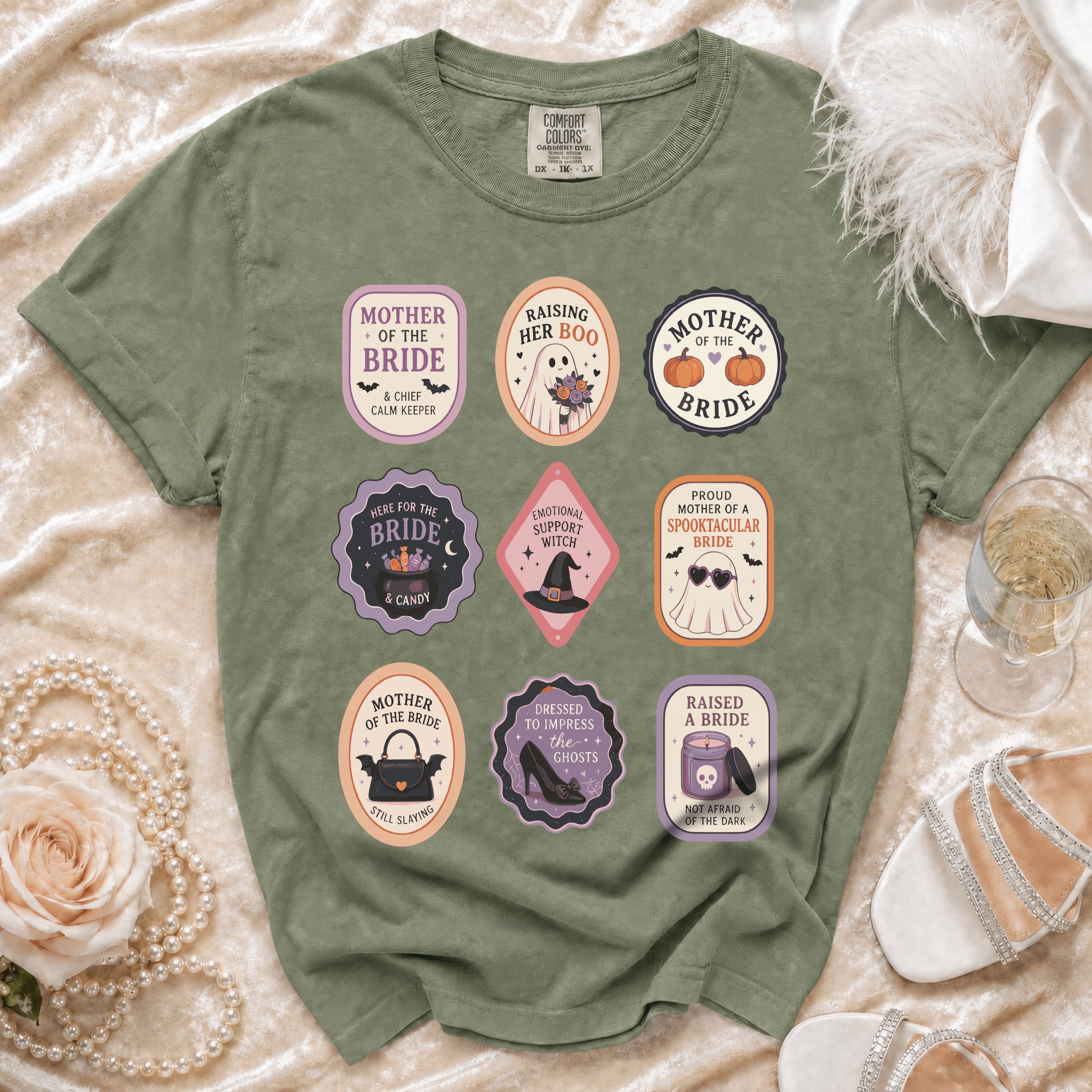 Green t-shirt with nine Halloween-themed bridal party patches.