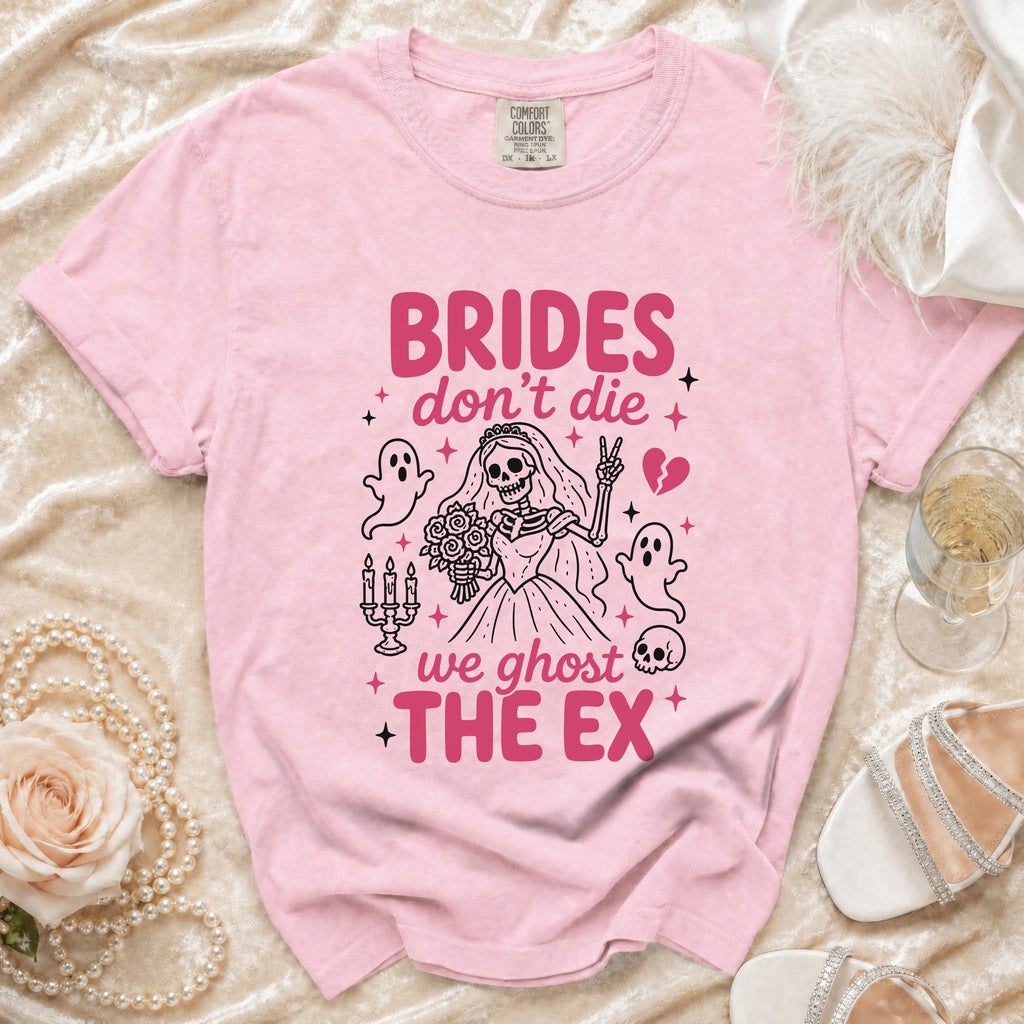 Pink t-shirt with skeleton bride graphic and text "BRIDES don't die we ghost THE EX".