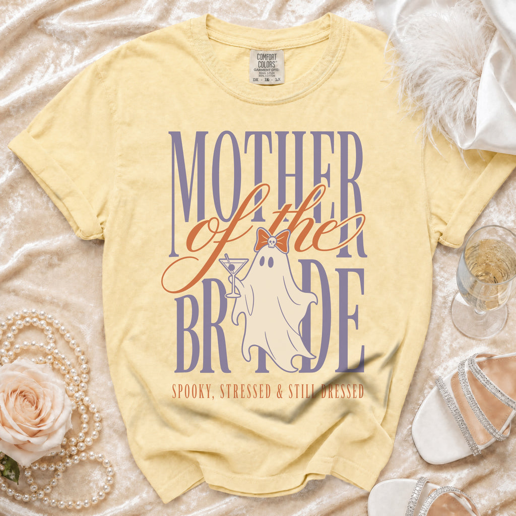 Yellow t-shirt with "MOTHER of the BRIDE" text, ghost, and "Spooky, Stressed & Still Dressed".