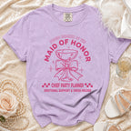 Lavender t-shirt with "Maid of Honor, Chief Party Planner" graphic and champagne glass.