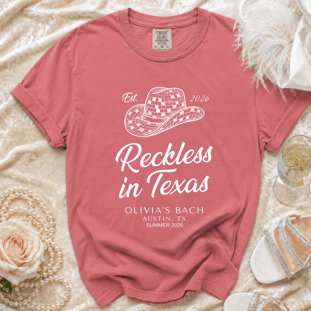 Comfort Colors t-shirt with "Reckless in Texas" and "Olivia's Bach" text.