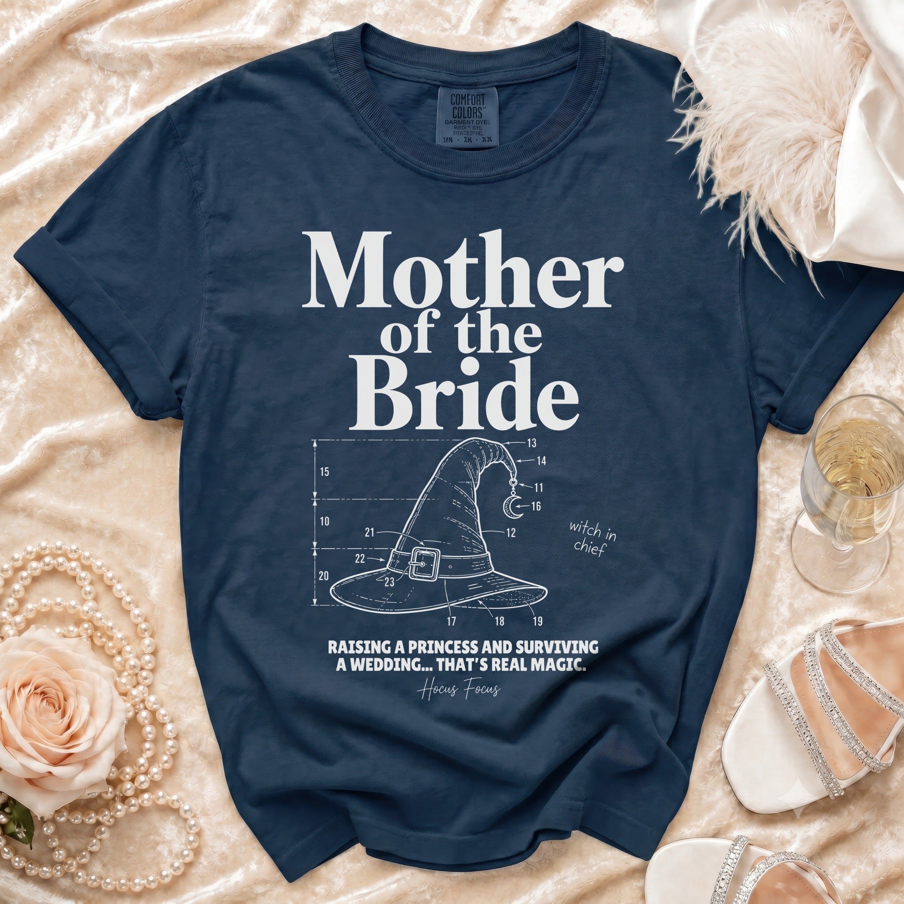 Navy t-shirt with "Mother of the Bride" graphic and witch hat design.