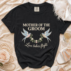 Black t-shirt with "Mother of the Groom" text and two birds around a wreath.