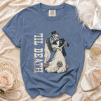 T-shirt with skeletons dressed as bride and groom dancing, reading "Til Death Do Us Part."