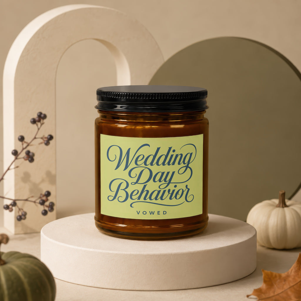 Candle jar with "Wedding Day Behavior" and "VOWED" text on a pale green label.