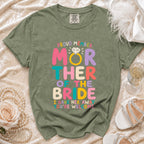 Green t-shirt with "Proud Member Mother of the Bride" text and wedding ring graphic.