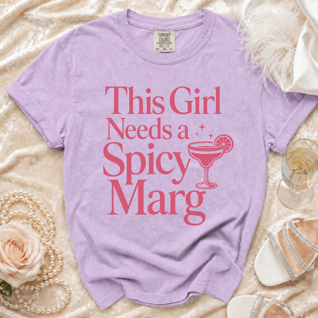 Lavender t-shirt with "This Girl Needs a Spicy Marg" graphic and margarita.