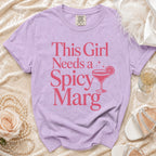 Lavender t-shirt with "This Girl Needs a Spicy Marg" graphic and margarita.