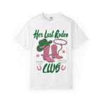 White t-shirt with pink cowboy boots and green text "Her Last Rodeo".