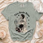 Green t-shirt with a skeleton bride graphic and the text "This Bride Bites".