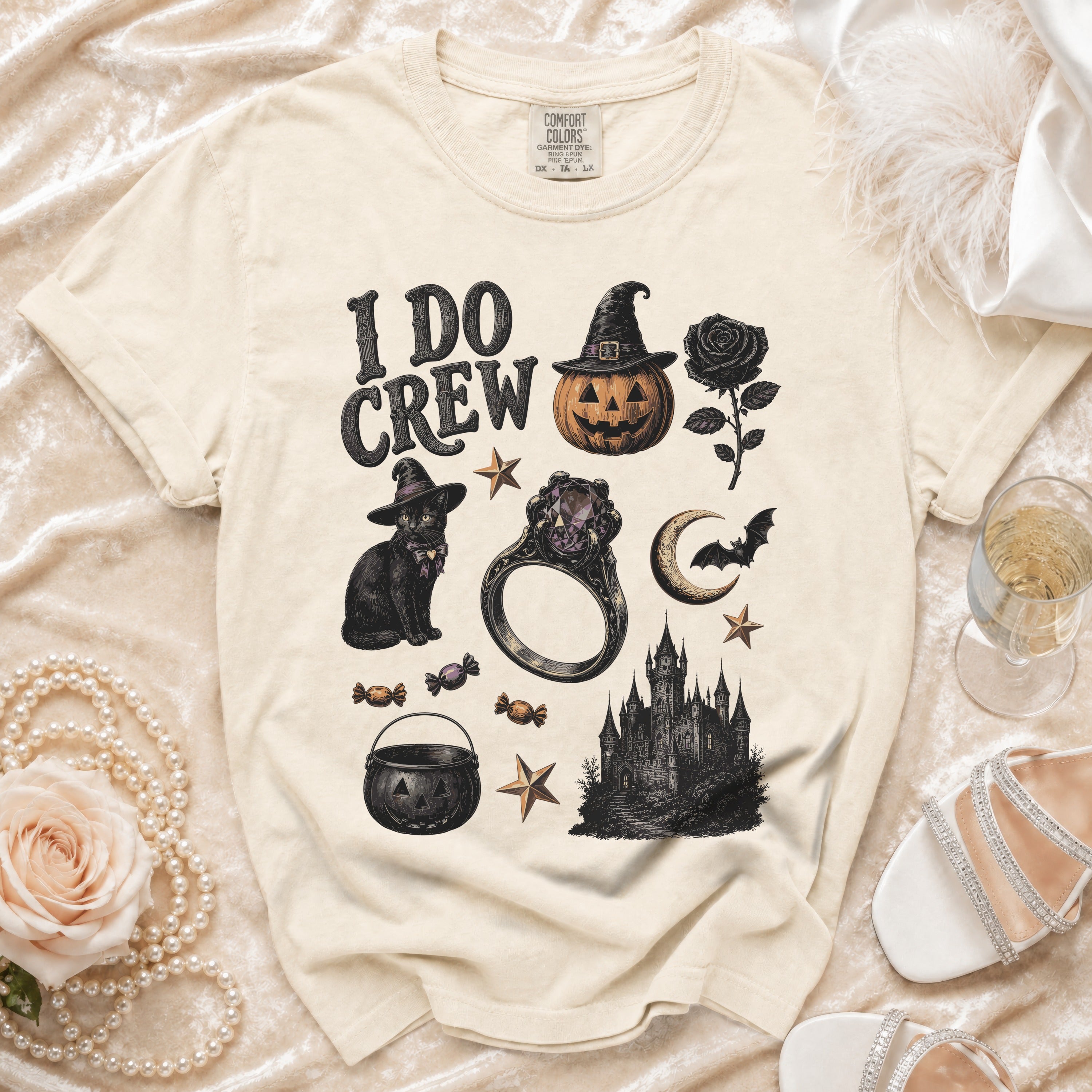 Cream t-shirt with "I DO CREW" and Halloween-themed graphics.