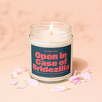 Glass candle with lit wick, label reads "Open in Case of Bridezilla".