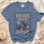 Blue t-shirt with "Bride Over Boos" graphic, a church, moon, and text.