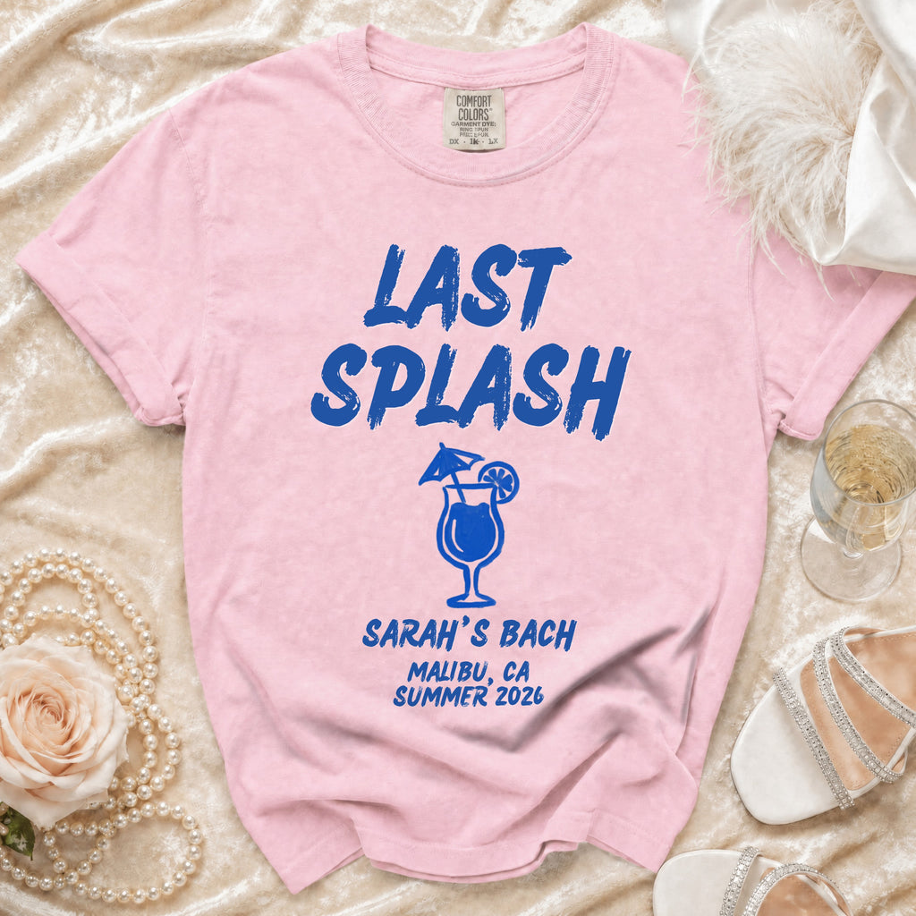 Pink t-shirt with "Last Splash Sarah's Bach Malibu, CA Summer 2026" in blue.