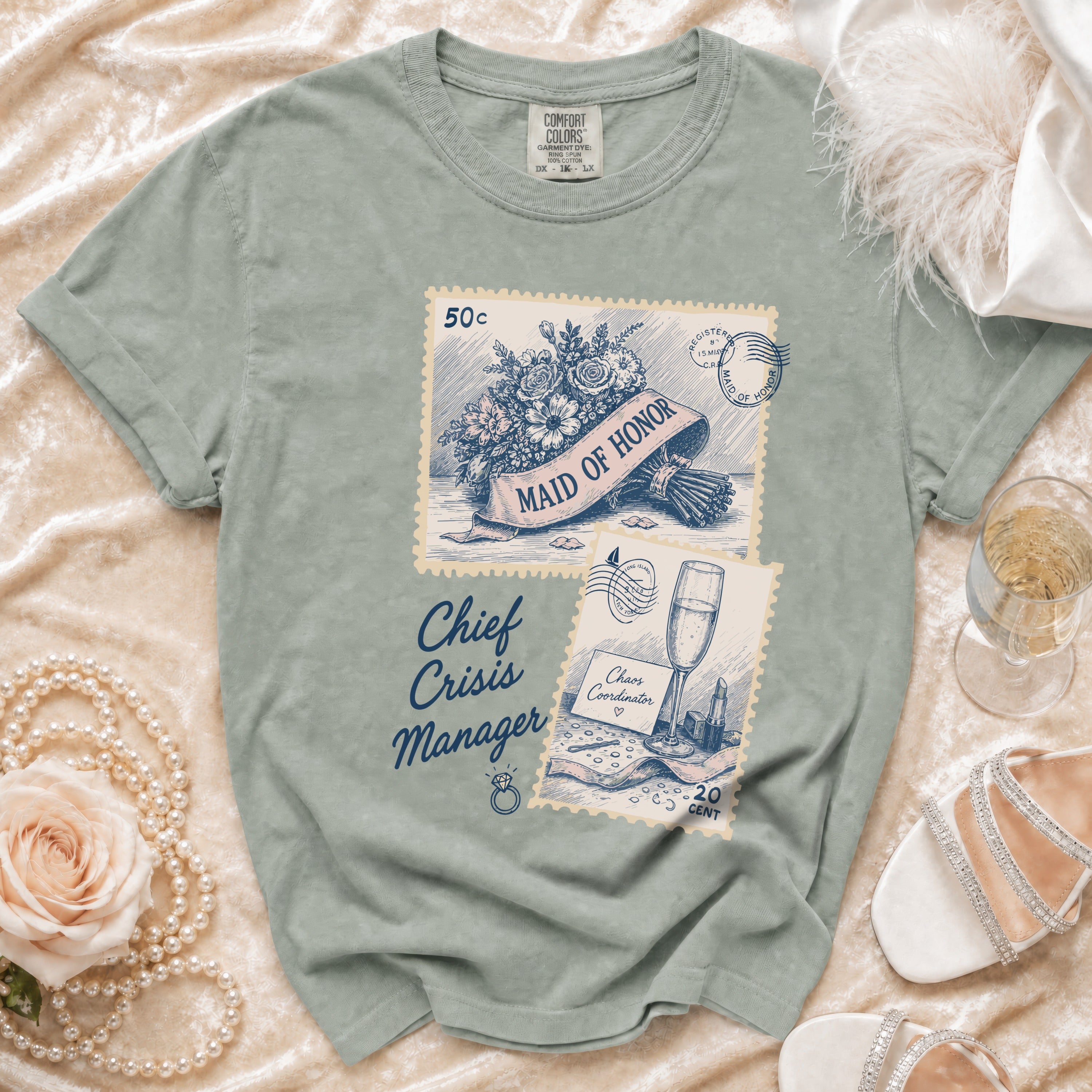 Sage green t-shirt with "Maid of Honor" and "Chief Crisis Manager" graphics.