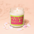 Jar candle with neon green label asking "Will You Be My Maid of Honor?"