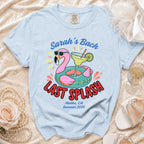 Light blue t-shirt with "Sarah's Bach LAST SPLASH" and flamingo graphic.