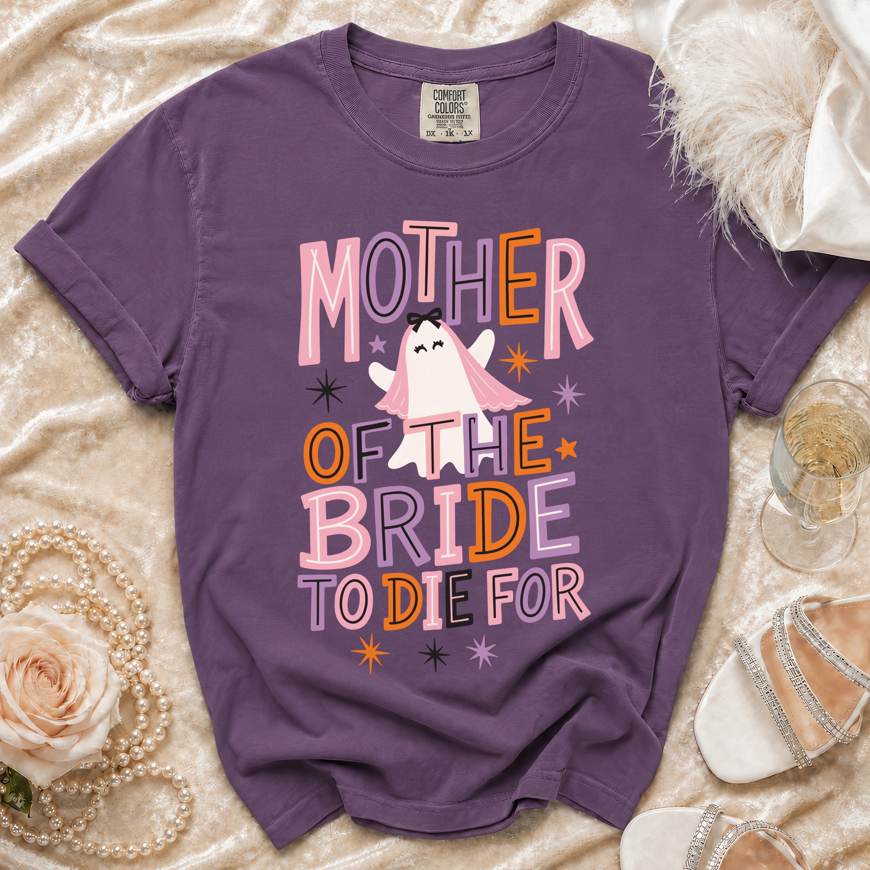 Purple t-shirt with ghost graphic and "Mother Of The Bride To Die For" text.