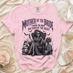 Pink t-shirt with "Mother of the Bride, I Raised the Bride, You Survive the Night" text.
