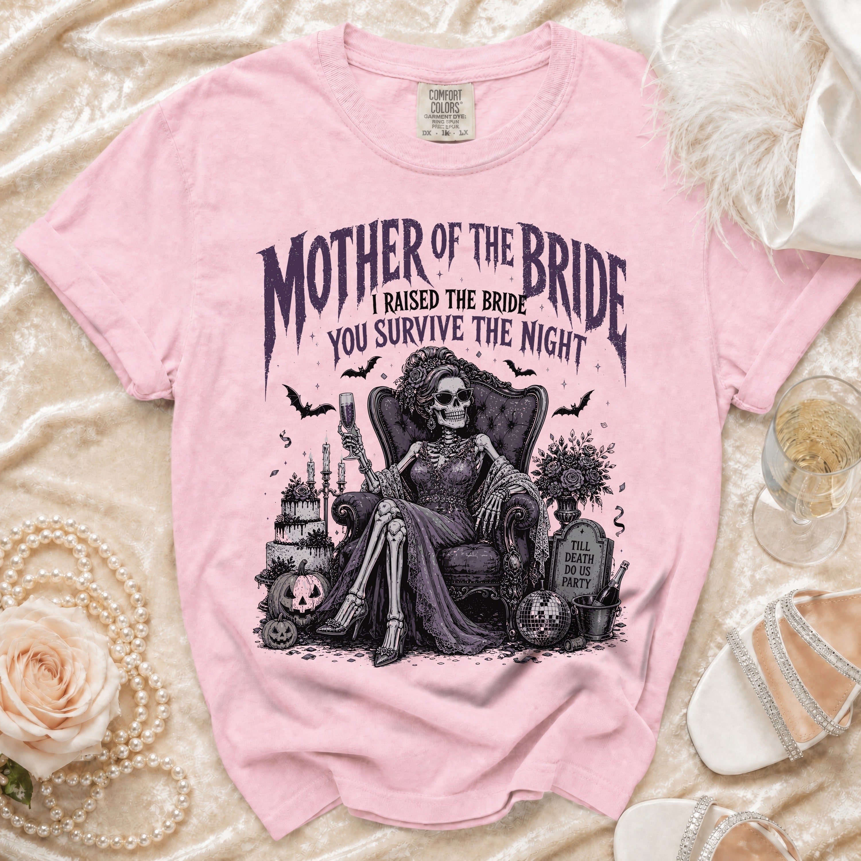 Pink t-shirt with "Mother of the Bride, I Raised the Bride, You Survive the Night" text.