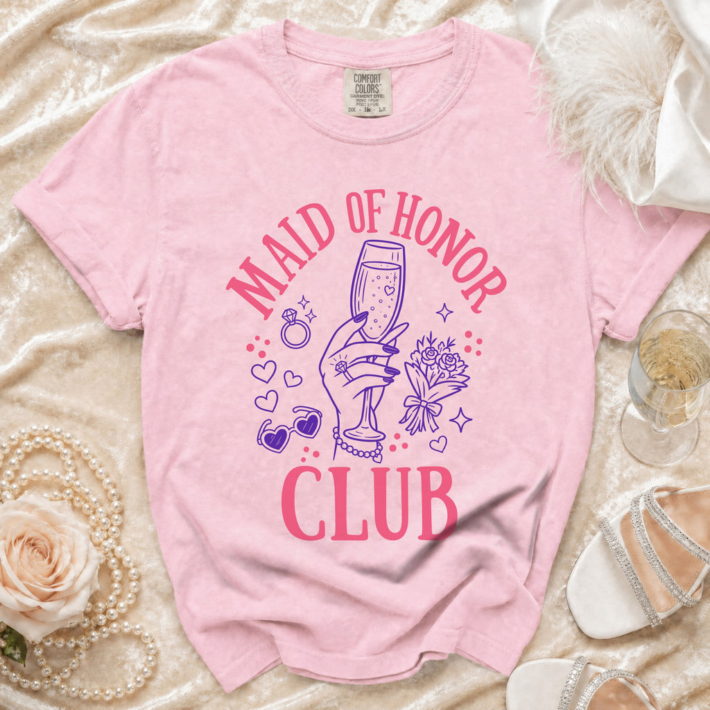 Pink t-shirt with "Maid of Honor Club" text and graphic design.