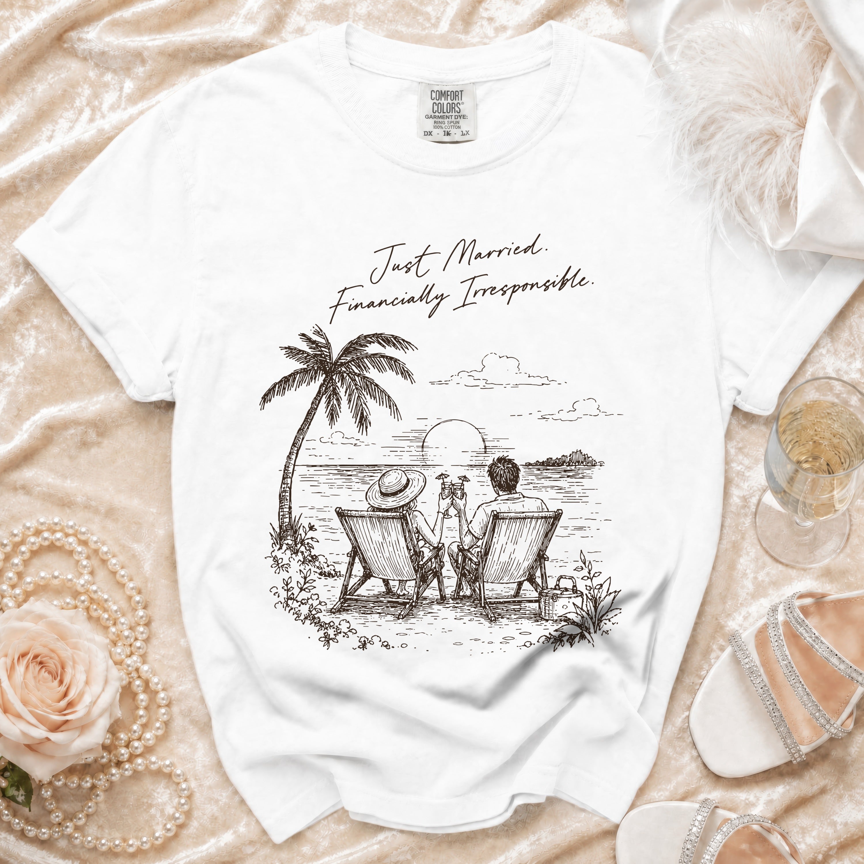 White t-shirt with "Just Married. Financially Irresponsible." graphic.