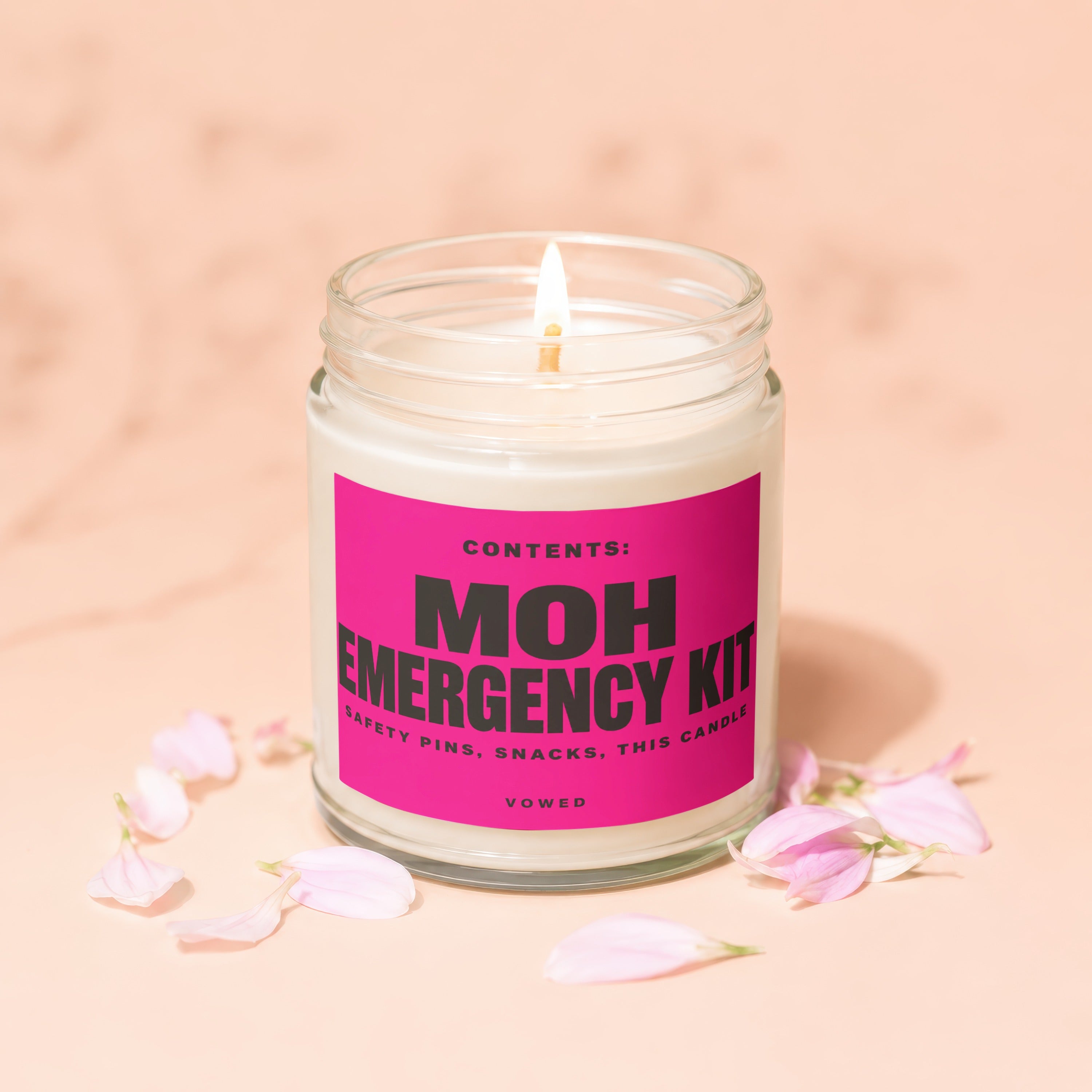 Candle with "MOH EMERGENCY KIT", "SAFETY PINS", "SNACKS", "THIS CANDLE" text.