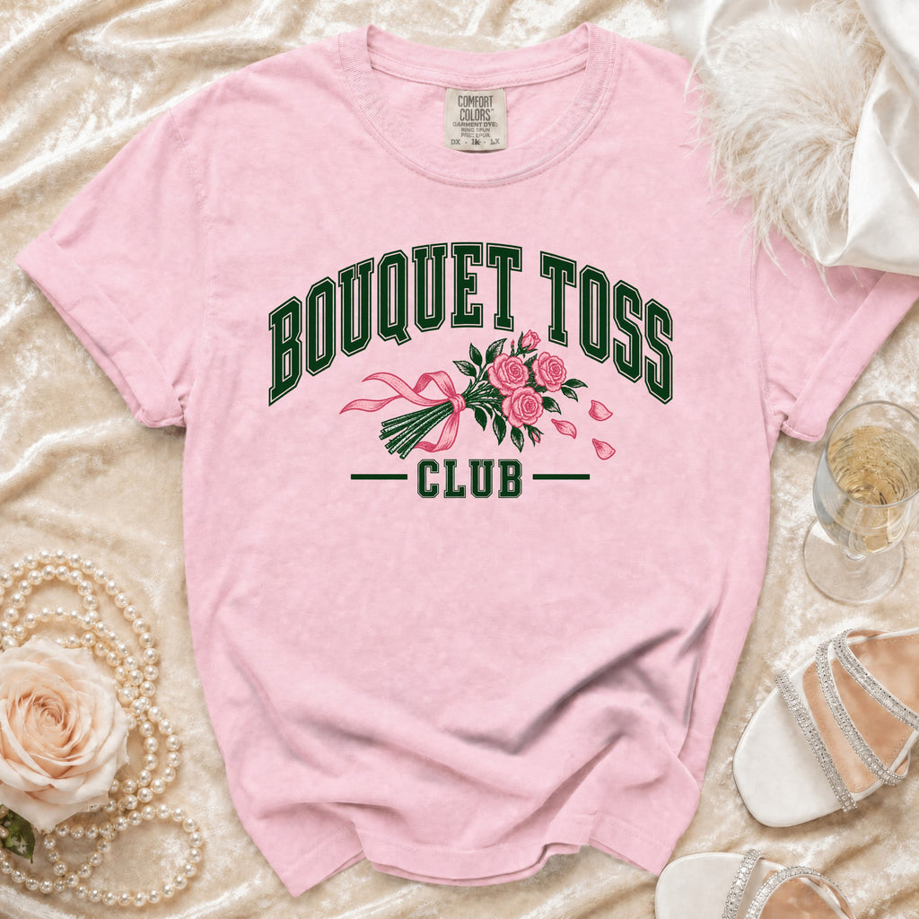 Pink t-shirt with "BOUQUET TOSS CLUB" text and floral design.